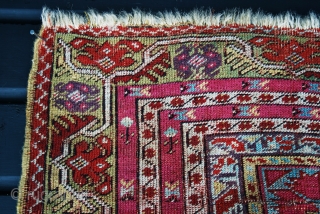 Early Anatolian prayer rug with brilliant colors and in reasonable condition for the age . Circa early to mid 19th century. Probably Kirsehir, but with Gördes elements.      