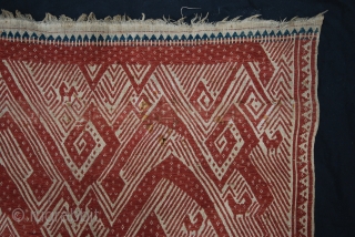 Tampan with unusual design: a single human like figure on a boat with above a dynamic atmosphere with spirals and animals (birds). It's a ceremonial textile from Sumatra. 19th century. Size 65  ...
