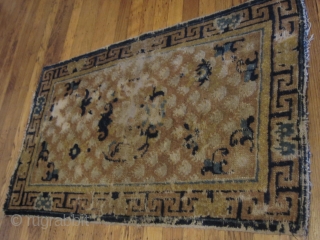  Ningxia carpet. Obvious wear, some holes and fraying around the edges. 3'1" x 1'10"


                  