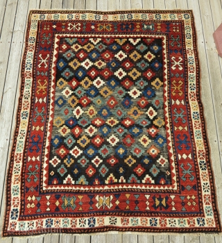 Caucasian Zakatala Rug, ca. 1880, 138x172cm, in very good condition (except partial corrosion of the black background in the field). 
Relatively small and squarish rug with all natural beautiful colours and shiny  ...