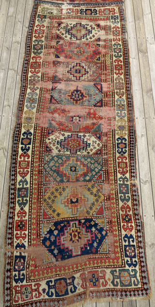 Early 19th century South East Caucasian Village Rug (probably from the Moghan steppe).
Beautiful old colors and powerful Archaic appearance! Nice old back with unusual mixture of wefting!
      