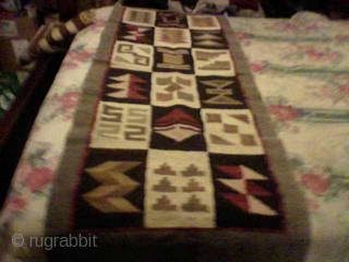 The first 3 rugs are all made of wool, the first rug and the third rug could be Native American,the striped one reminds me of arrowheads , the next one has the  ...