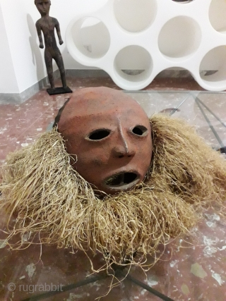 Antique Makishi mask (Zambia) in clay and wood. 

                        