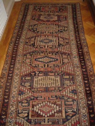 North West Persian Rug, circa 1910 
2.90 m x 1.10 m (9 ft. 8in. x 3ft. 8in.)
                