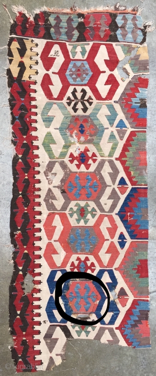 Anatolian kilim fragment, 19th c., featuring the notorious double hook design, 1 center patched (see it circled)                