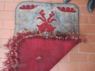 Turkish saddle with leather and metal thread decoration and felt on back. Unknow origine of the pile. Very collectible piece. SOLD
            