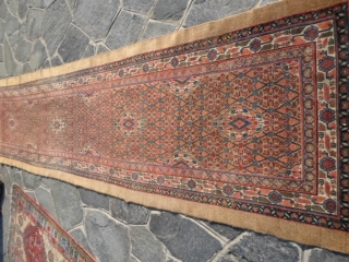 4 x 1 m. is the size of this antique Persian carpet khotted around 1900/1910 in
the region of serabend. Camel hair and beautiful color and very very good the
condition of this runner.  ...