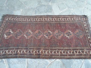 Antique persian Belouch very fine knot. Size 188x90 cm.
All wool and all natural dyes. Very original design with
turkmen gols. More info or pictures on request. 
REGARDS  from lake of COMO!   ...
