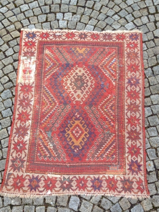 JUST AS FOUND! Beautiful and early Bordjalou rug, unfortunately with many bad repairs but due to its colors and rare white-grounded star border it still has lots of magic and character I  ...
