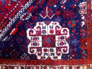 This antique rug is an old hand knotted Qashqai(also known as Shiraz), came in 308cm * 210cm, made of fully saturated shiny colored goat hair. The flowers and shapes are woven beautifully  ...