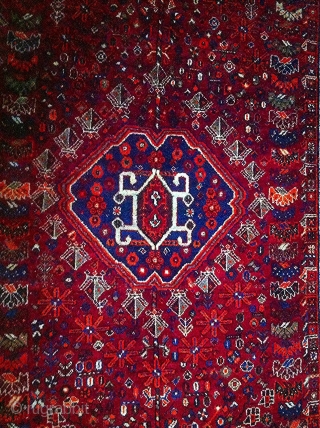 This is a quite old Qashqai rug (also known as Shiraz). It comes in 260 * 164 cm. Shiny natural dyes and excellent condition except for some damages by moth on the  ...