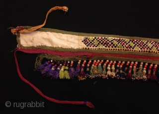 Old Uzbek silk tassel ethnic and tribal collectible tassel hanging decorative tassel

Size: 80 cm x 8 cm
Tassel height: 3 cm

100% handmade

VINTAGE UZBEK TASSELS :
”Segusha”( Triangle) is a decorative embellishments, whose function, was  ...