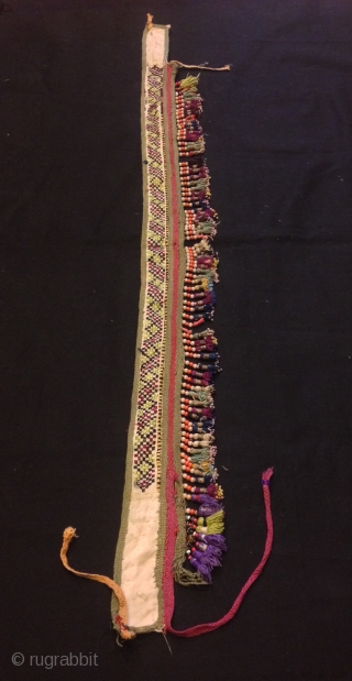 Old Uzbek silk tassel ethnic and tribal collectible tassel hanging decorative tassel

Size: 80 cm x 8 cm
Tassel height: 3 cm

100% handmade

VINTAGE UZBEK TASSELS :
”Segusha”( Triangle) is a decorative embellishments, whose function, was  ...