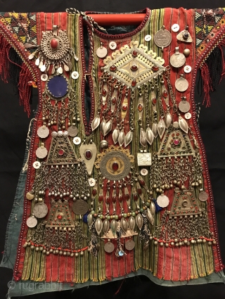 Turkmen tekke vintage handmade baby kaftan 

Size: 
Height : 50 cm
Lenght : 35 cm

Vintage Traditional Nomad child ceremonial dress & vest a child would wear and The Dress is decoreted by hand  ...