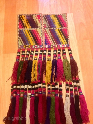 Multi colored antique Uzbek tassel

Size: 60 cm X 15 cm

100% handmade

VINTAGE UZBEK TASSELS :
”Segusha”( Triangle) is a decorative embellishments, whose function, was to decorate the beddings tucked away folded against the walls  ...