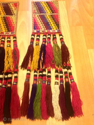 Multi colored antique Uzbek tassel

Size: 60 cm X 15 cm

100% handmade

VINTAGE UZBEK TASSELS :
”Segusha”( Triangle) is a decorative embellishments, whose function, was to decorate the beddings tucked away folded against the walls  ...