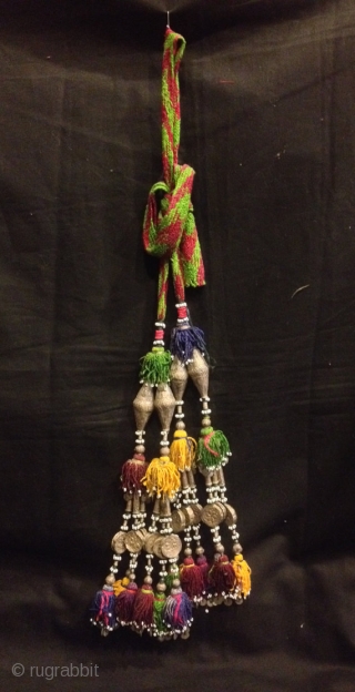 Vintage Uzbek afghan tribal silver tassel

Size :
Height : 30 cm (with out rope size)

100 handmade

VINTAGE UZBEK TASSELS :
”Segusha”( Triangle) is a decorative embellishments, whose function, was to decorate the beddings tucked away  ...