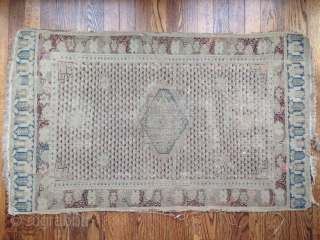 18th century rug. fine weave. size approximately 2' x 3'6".  mends, repairs/restorations varying in expertise, back side border and center have very old glue. some splits, faux applied fringe sewn on  ...