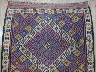 Eastern Kurdish kilim. Circa 1950. Wool on cotton. Good condition.

Size: 147 cm x 231 cm (58” x 91”).               