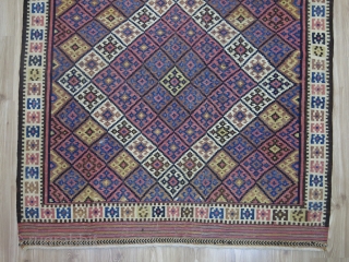 Eastern Kurdish kilim. Circa 1950. Wool on cotton. Good condition.

Size: 147 cm x 231 cm (58” x 91”).               