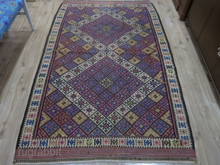 Eastern Kurdish kilim. Circa 1950. Wool on cotton. Good condition.

Size: 147 cm x 231 cm (58” x 91”).               