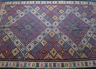 Fine Kurdish kilim. Wool on cotton.
Size:  147 cm x 231 cm (58” x 91”).
                  