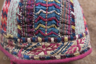 Turkmen Tekke ethnic child hat, silk embroidery on hand loomed cotton and silk. Embroidered trim and cotton lining. Circa 1900 or earlier.
Size: 5” – 13 cm circumference / 4” – 10 cm  ...