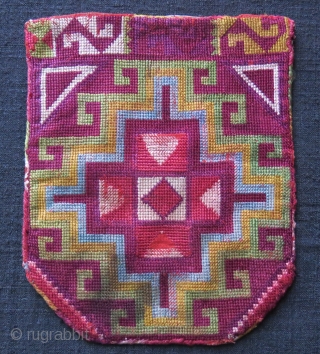 Tajikistan Lakai silk embroidery bag. Both side cross stitch fine embroidery, tiny wears and little stain on one side lower left. Circa 1900. Size: 7” by 5.5” (17 cm X 14 cm).


 