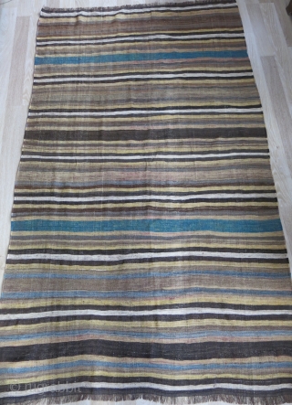 Luri Baktiari tribal minimalist bedding pile cover kilim. All wool  2” narrowed from each side. Faded fuchsine and good natural colors. A real tribal weaving. Late 19th. Size: 89” X 52” (225 cm X  ...