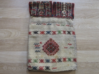 A very nice sample of Turkish kilim saddle bag, with a traditional weaving technique called zili. It is from Konya region, Central Anatolia. Circa 1930-40s. All wool with some natural some unnatural  ...