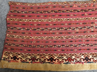 Turkmen Tekke mini akh chuval. Second half of 19th century. Some wears stitched. 
Size: 85 cm x 38 cm (33.5"x 15").            