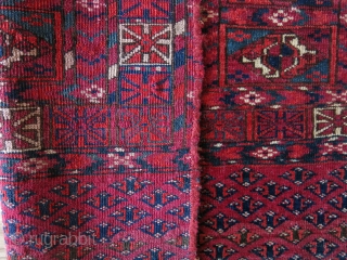 Turkmen Tekke chuval. Size: 109 cm x 67 cm (42.9" x 26.3"). It has a small patching in  the center as can be seen in the photos.     