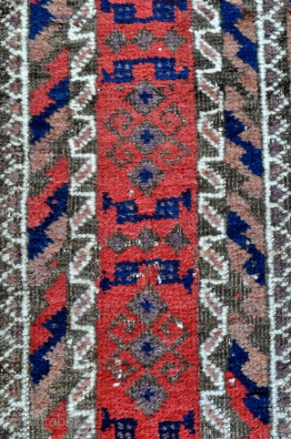 Baluch rug with Gurbaghe Guls and rare border, all natural colors including a nice lavender and purple, 19th c. piece in good original condition without repairs.
Side selvages in good original condition and  ...