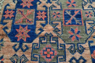 Baluch rug with Gurbaghe Guls and rare border, all natural colors including a nice lavender and purple, 19th c. piece in good original condition without repairs.
Side selvages in good original condition and  ...