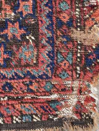 Baluch Bagface with lovely colors, shaggy pile with some corrosion and old moth nibbles, mixed wefting, cotton, wool and camel hair? - mete@yorukruggallery.com          