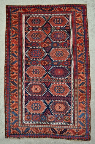 Colorful Kurdish rug of the Jaff/Sanjabi group from Northwest Persia - 4’9 x 7’4 ft. – 144 x 223 cm.             