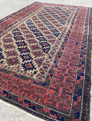 Baluch rug with Camel field, well-drawn main border with positive/negative effect and I particularly like the floating effect of the border framing the field - good condition, no repairs - 2'8 x  ...