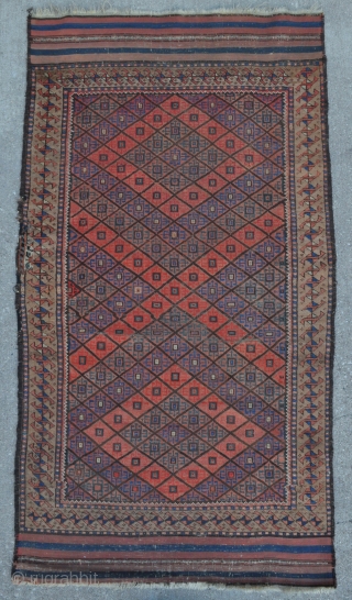 Beautiful and rare Baluch rug with unusual Camel border and Graphic field drawing, symmetrically knotted - 3’3 x 5’10 – 99 x 178 cm. with kilim ends.      
