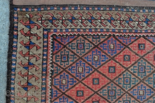 Beautiful and rare Baluch rug with unusual Camel border and Graphic field drawing, symmetrically knotted - 3’3 x 5’10 – 99 x 178 cm. with kilim ends.      