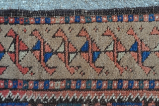 Beautiful and rare Baluch rug with unusual Camel border and Graphic field drawing, symmetrically knotted - 3’3 x 5’10 – 99 x 178 cm. with kilim ends.      
