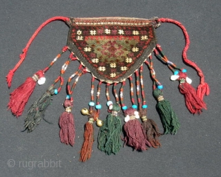 Pair of Baluch camel knee covers or "dizlik".  7 X 8" exclusive of tassels.  Good condition, even pile, tassels intact and decorated with shells and beads.  No holes or  ...