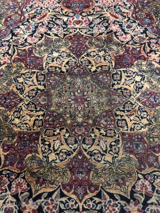 Isfahan Ahmadi, c. 1900, 6'7" x 4'6". Wool on cotton. Very finely knotted, rich colors with uneven pile. Some wear to the selvedge. Rare piece.        