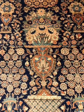 Antique Kashan, c. 1930. 8'6" x 4'5". Haj Khanoumi design in ochre, indigo, and teal green. Wool on cotton. Finely knotted, low even pile with some minor wear at the edges. Professionally  ...