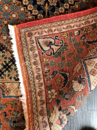 Antique Kashan, c. 1930. 8'6" x 4'5". Haj Khanoumi design in ochre, indigo, and teal green. Wool on cotton. Finely knotted, low even pile with some minor wear at the edges. Professionally  ...