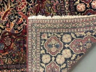Isfahan Ahmadi, c. 1900, 6'7" x 4'6". Wool on cotton. Very finely knotted, rich colors with uneven pile. Some wear to the selvedge. Rare piece.        