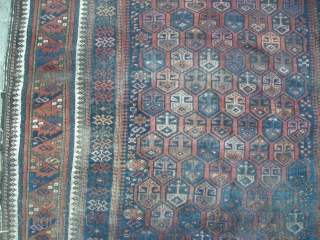 Antique Beluch rug c1900. 7ft x 3ft6 . This old Beluch is in need of a deep clean, there is good shiny wool under all the grime.The rug is in original condition  ...