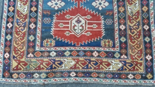 a Fine mid 19th century karagashli of unusual rug size 180 x 115,
old repairs some damage and backed but nice early colours.           