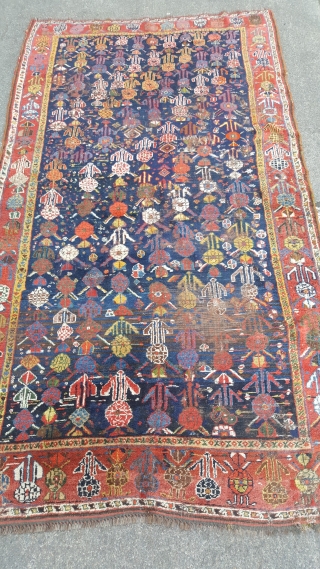 A lovely Antique khamseh rug 270x140. This rug has numerous old repairs and a few low areas. It could still be used on the floor or as a hanging and retains all  ...