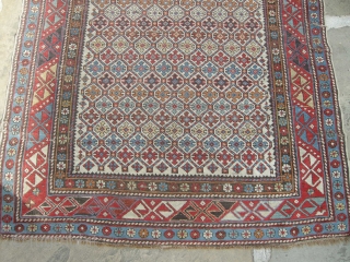 A good 19th century shirvan prayer rug in original condition needs a clean light wear and a few small holes but with ends and sides mostly in tact.     