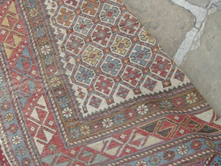 A good 19th century shirvan prayer rug in original condition needs a clean light wear and a few small holes but with ends and sides mostly in tact.     